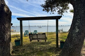 Property grounds - Waterfront cottage with huge yard, lagoon views, dock, grill, & W/D (Fort Morgan)