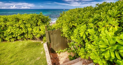 Beachfront Paradise! Enjoy surf & sunsets on beautiful uncrowded beach. Relax!