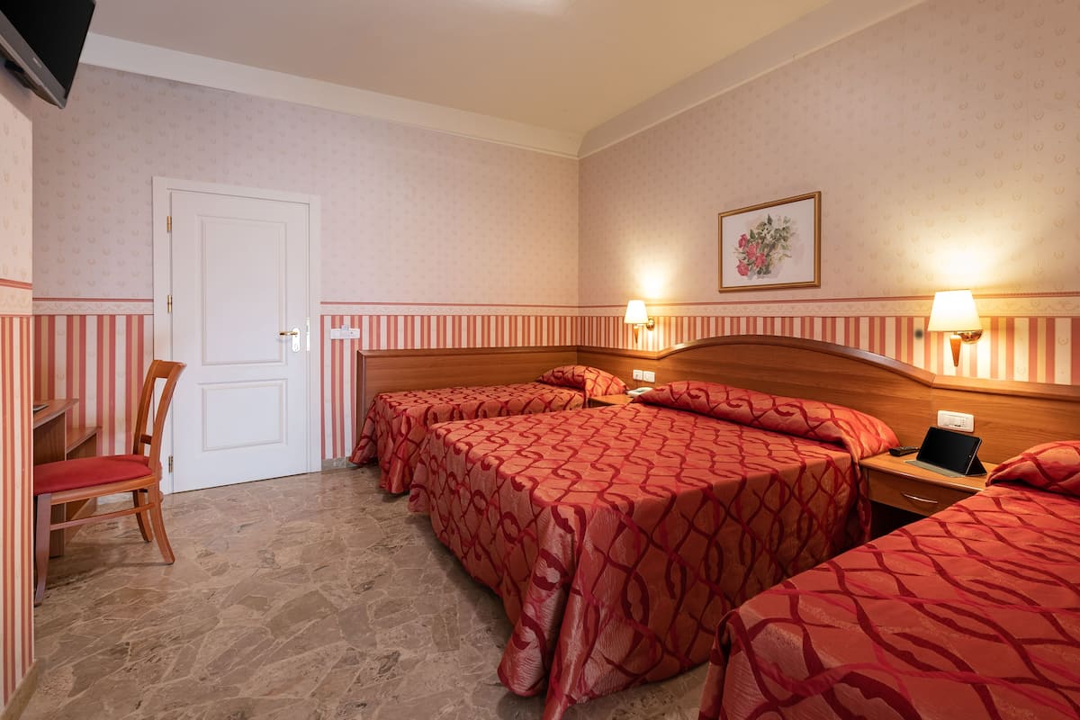 Superior Quadruple Room, Pool View | Premium bedding, down comforters, in-room safe, desk