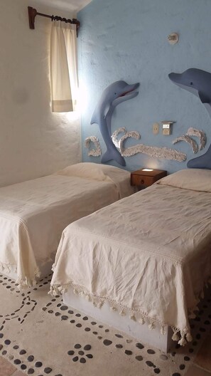 4 bedrooms, iron/ironing board, travel cot, WiFi
