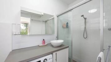 Shower, hair dryer, shampoo