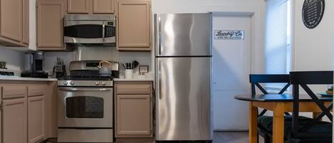Fridge, microwave, toaster, cookware/dishes/utensils