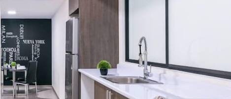 Fridge, microwave, stovetop, cookware/dishes/utensils