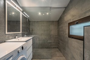 Shower, hair dryer, towels, toilet paper