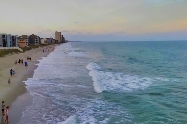 Nära stranden, solstolar och strandhanddukar