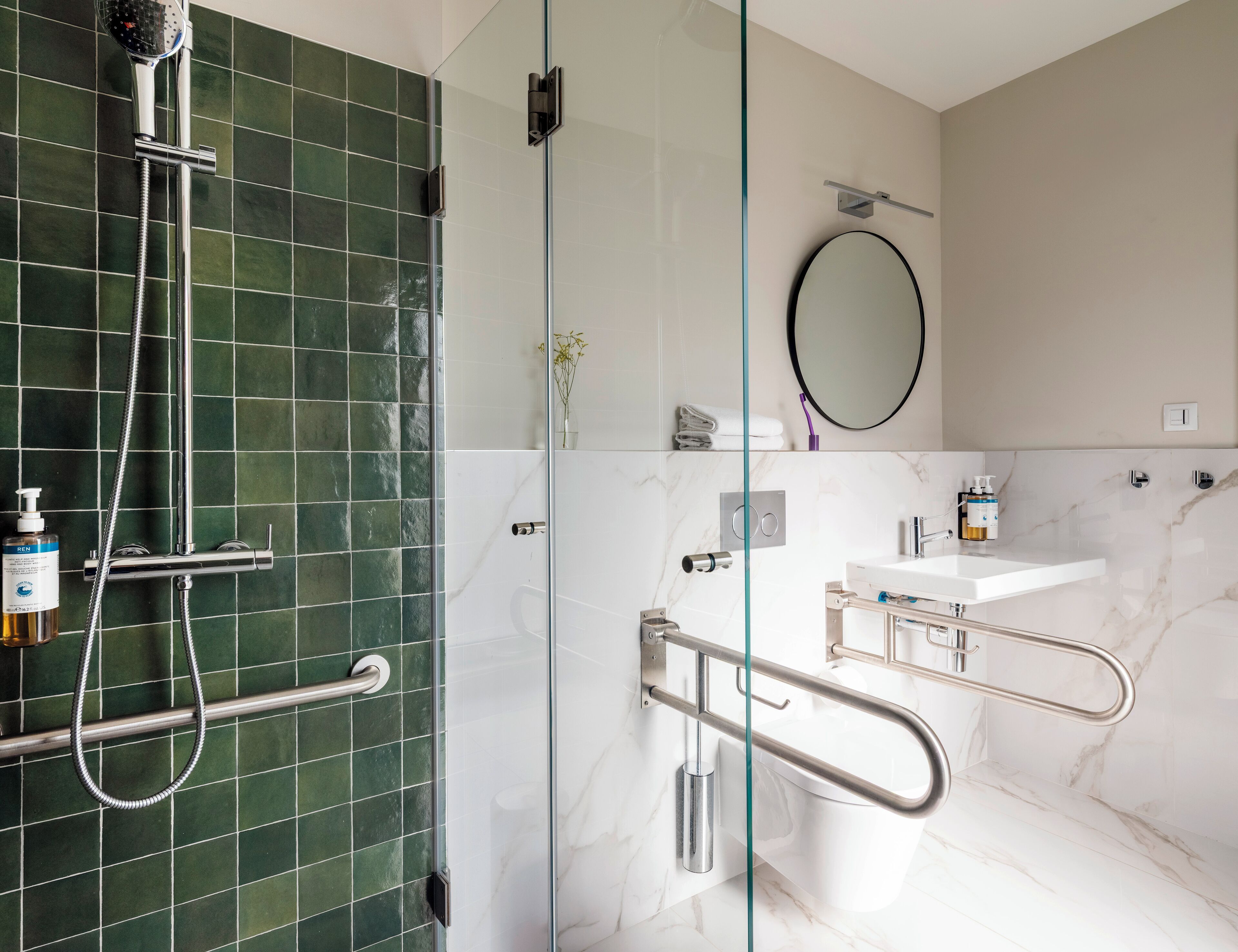 Shower, designer toiletries, hair dryer, towels