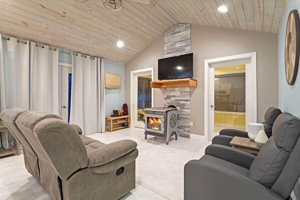 Living area - Cozy one level - open floor plan, split bedrooms, in-floor heat, wood stove (Mora)