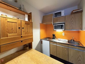 Fridge, microwave, cookware/dishes/utensils
