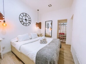 1 habitación, tabla de planchar con plancha, wifi gratis y ropa de cama 