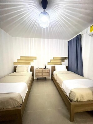 2 quartos, cofres nos quartos, ferros/tábuas de passar roupa