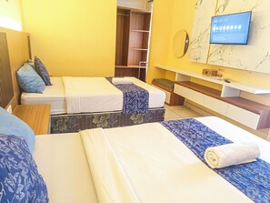 Deluxe Twin Room | Bed sheets - Miraa Guest House & Resto (Denpasar)