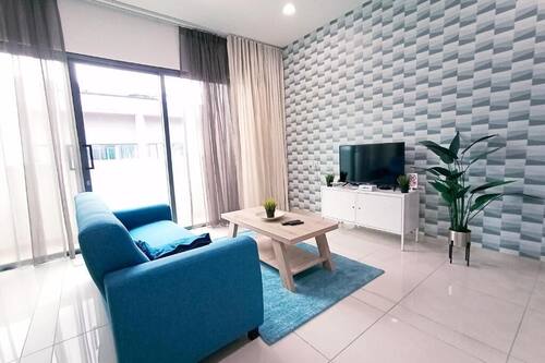 Apartamento ejecutivo | Zona de estar | Smart TV de 50 pulgadas con canales digitales