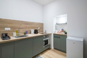 Microwave, coffee/tea maker, toaster, cookware/dishes/utensils