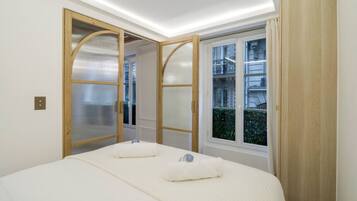 1 chambre, fer et planche à repasser, Wi-Fi, draps fournis