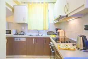 Refrigerador, microondas, parrilla de estufa y lavavajillas 