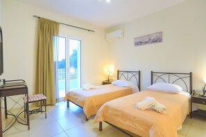 3 habitaciones, tabla de planchar con plancha, internet y ropa de cama 