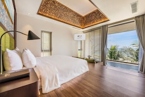 Three-bedroom beachfront villa with private pool | Minibar, in-room safe, desk, blackout drapes