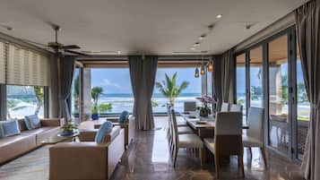 Four-bedroom beachfront villa with private pool | Living area | 55-inch Smart TV with digital channels
