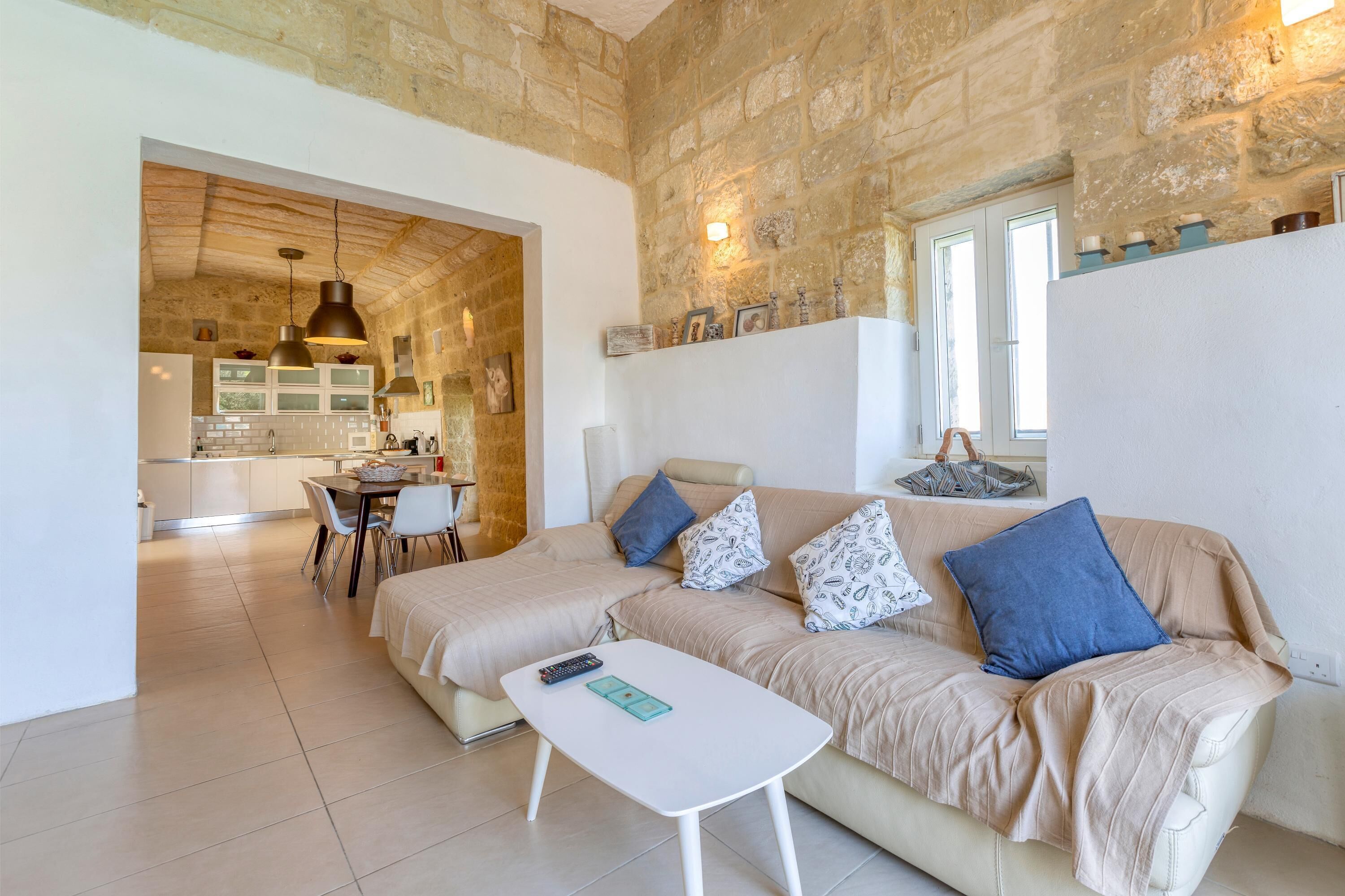 Family Townhome, 3 Bedrooms (Ta'Patee Pool Farmhouse in Gozo) | Living area | 21-inch Smart TV with cable channels