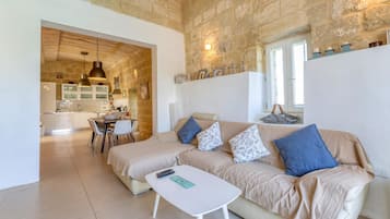 Family Townhome, 3 Bedrooms (Ta'Patee Pool Farmhouse in Gozo) | Living area | 21-inch Smart TV with cable channels
