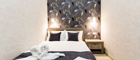 Departamento | Tabla de planchar con plancha, wifi gratis y ropa de cama