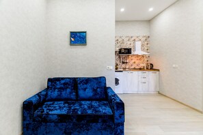 Apartamento | Zona de estar | Televisión LED de 32 pulgadas con canales digitales