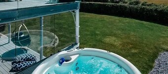 Stunning luxury stay, with hot tub, tennis court and sea views. Sleeping 16-18.