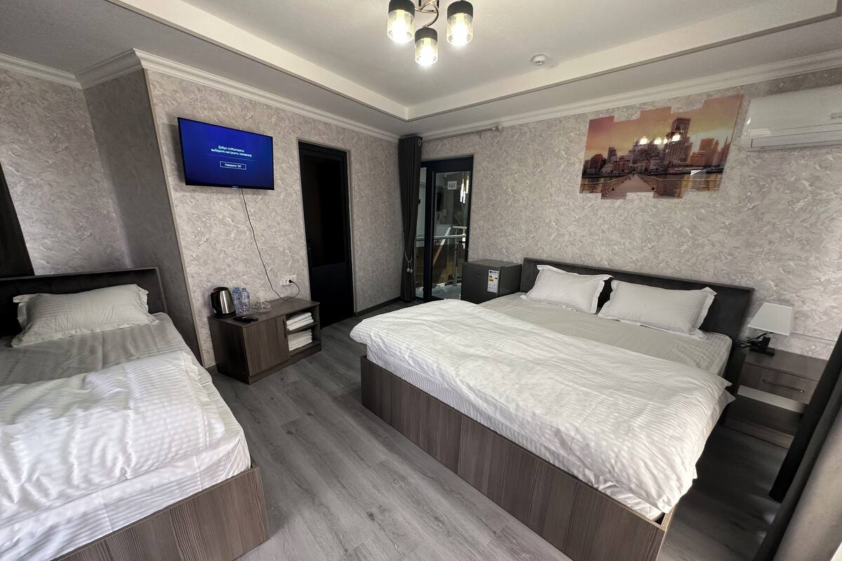 Family Triple Room, City View | Free WiFi, bed sheets