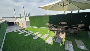 Family Triple Room, City View | Terrace/patio - Byond Hotel & Hostel (Tashkent)