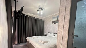 Comfort Double Room, City View | WiFi (free), bed sheets - Byond Hotel & Hostel (Tashkent)