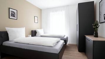 Family Apartment, 2 Bedrooms | Desk, laptop workspace, soundproofing, free WiFi