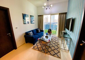 Leilighet, 1 soverom, balkong, byutsikt | Oppholdsområde