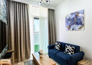 Appartamento, 1 camera da letto, balcone, vista città | Area soggiorno