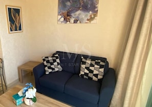 อพา  ร์ทเมนท์, 1 ห้องนอน, ระเบียง, วิวทะเล | ห้องนั่งเล่น