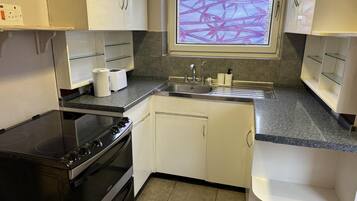 Apartment | Private kitchen | Fridge, microwave, oven, stovetop