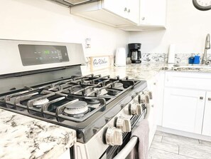 Fridge, microwave, oven, stovetop - Welcome to our chic and modern hideaway, just minutes from downtown San Diego, Balboa Park, and North Park. (San Diego)