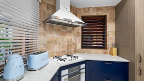 Fridge, dishwasher, toaster, dining tables