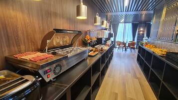 Daily buffet breakfast (EUR 15 per person)