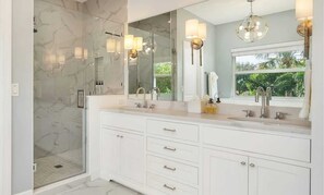 Shower, eco-friendly toiletries, hair dryer, towels