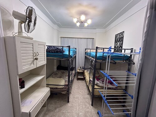 Affordable 4-single beds hostel in the middle of Alexandria!