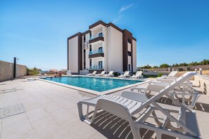 Apartment, 1 Bedroom, Balcony, City View | Pool | Outdoor pool