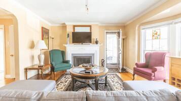 Signature House, Non Smoking, Patio | Living room | 40-inch Smart TV with digital channels