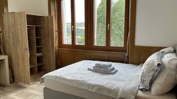 1 bedroom, desk, iron/ironing board, travel cot