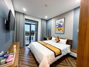 Chambre Double Deluxe, 1 très grand lit | Literie de qualité supérieure, articles gratuits dans le mini-bar