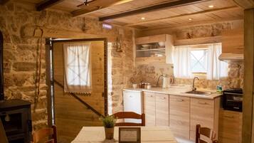 Fridge, stovetop, coffee/tea maker, cookware/dishes/utensils