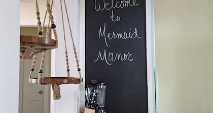 The cozy Mermaid Manor is located close to area beaches and all area attractions