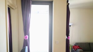 Huoneisto, 1 makuuhuone, parveke, näköala puutarhaan | Oleskelualue