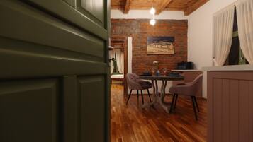 Business-Apartment | Wohnbereich | 102-cm-Smart-TV mit Kabelempfang, Netflix, Fußbodenheizung