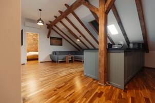 Superior Apartment | Living area | 102-cm Smart TV with cable channels, Netflix, heated floors