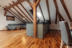 Superior Apartment | Living area | 102-cm Smart TV with cable channels, Netflix, heated floors